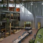 Digitale Nomaden in den Niederlanden: Visa, Coworking & Community Arbeitsplätze in der LocHal, einer umgebauten Lokhalle mit Bibliothek und Coworking in Tilburg