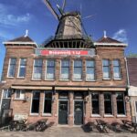 Die besten holländischen Biersorten: Ein Guide für Genießer Brouwerij 't IJ unter der Windmühle De Gooyer in Amsterdam